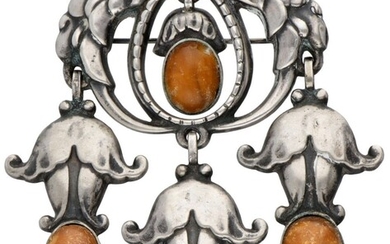Early 830 silver no.95 brooch set with amber by Danish designer Georg Jensen.