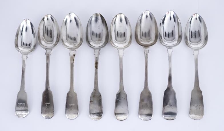 Eight Georgian and Victorian Silver Fiddle Pattern Table Spoons...