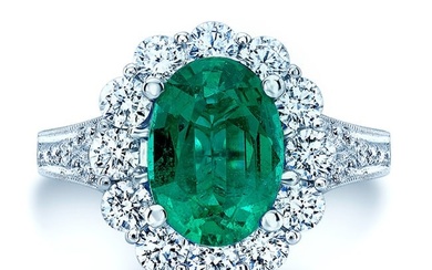 Emerald Oval And Diamond Halo Ring In 14k White Gold