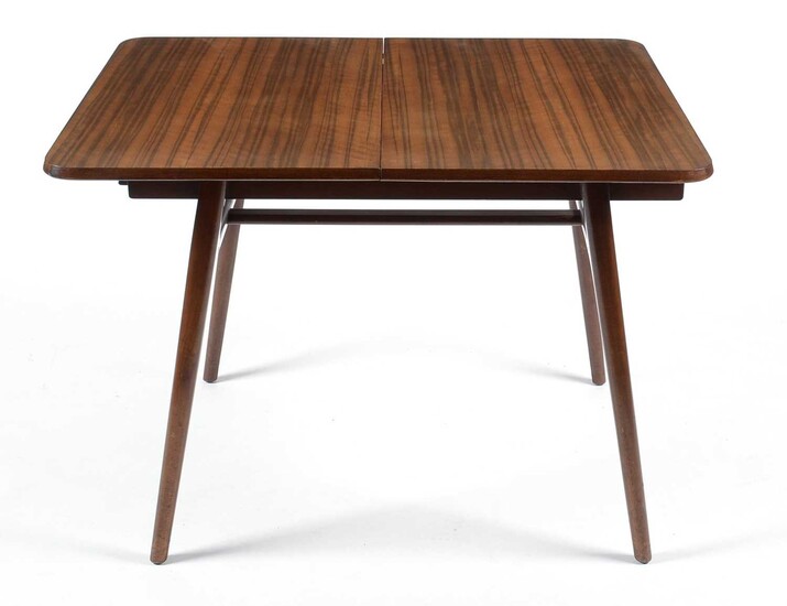 Everest: a mid Century walnut extending draw leaf dining table.