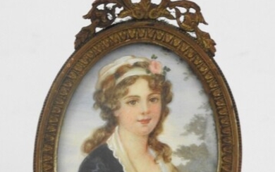F. DUMONT : Portrait de jeune fille. Miniature en ovale. Signé en bas à droite....