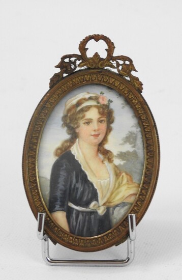 F. DUMONT : Portrait de jeune fille. Miniature en ovale. Signé en bas à droite....