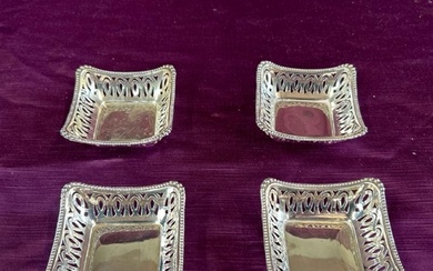 FOUR HALLMARKED SILVER BONBON DISHES BY S AND C CO., EACH 8 ...