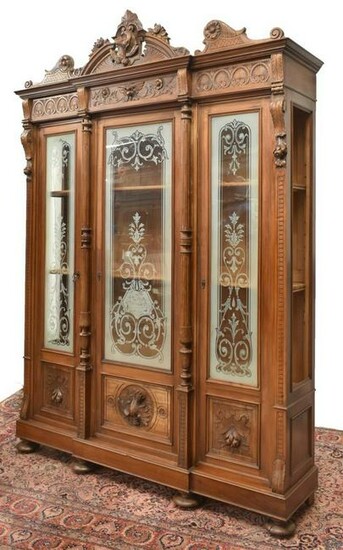 FRENCH CARVED WALNUT HUNT BOOKCASE