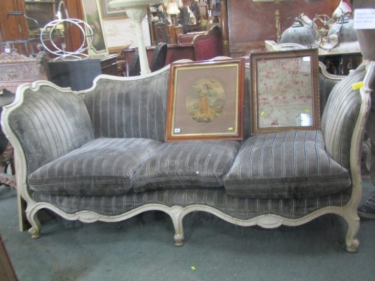 FRENCH STYLE SETTEE, a painted and carved triple seater sett...
