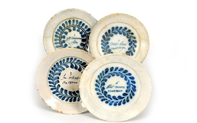 Four Delft ~Merry Man~ plates late 17th century,...