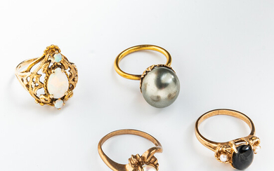 Four Gold and Gem-set Rings
