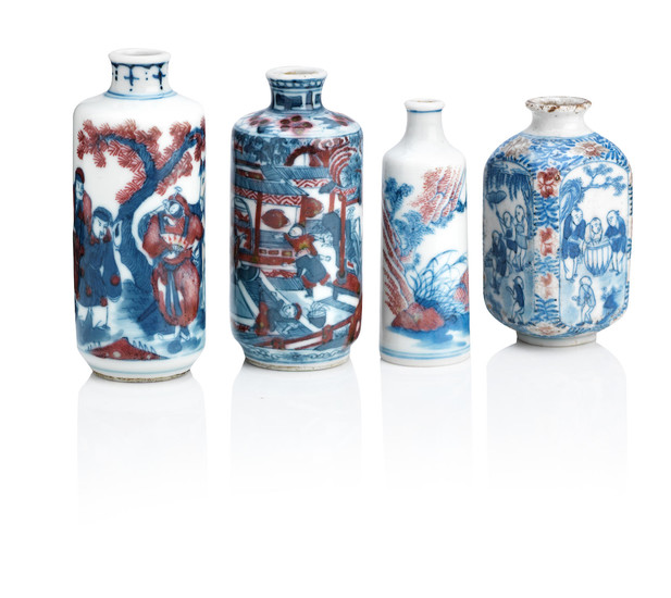 Four underglaze blue and copper-red snuff bottles