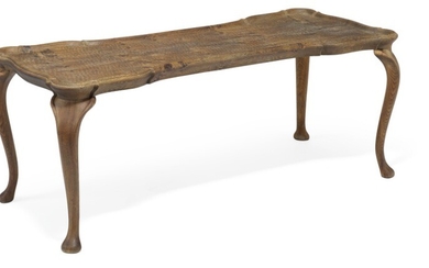 Frits Henningsen, attributed: Coffee table of carved, patinated oak with cabriole legs. Curvy top with raised edges.