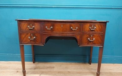 Georgian mahogany serpentine shaped desk with four drawers a...