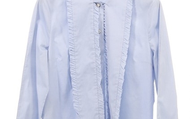 Gucci: A light blue cotton blouse with long sleeves, seven buttons and ruffle details on the front and on the sleeves. Str. 46 (IT). Approx. size 40–42.