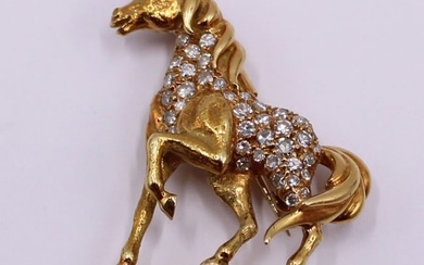 JEWELRY. 18kt Gold and Diamond Horse Brooch.