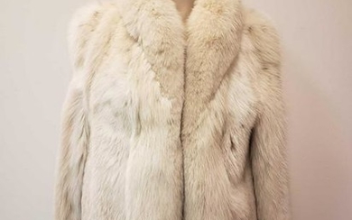 Jaguar Cross Fox Fur Coats