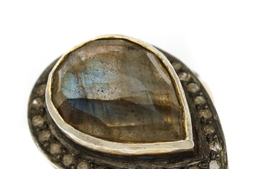 Jewels CPH: An labradorite and diamond ring set with a pear-shaped labradorite encircled by numerous sinlge-cut diamonds, mounted in sterling silver.