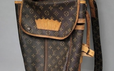 Louis Vuitton Golf Bag with tan leather trim, the front lower zip pouch , Made in France.