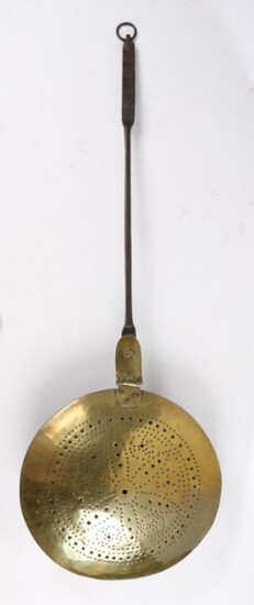 Mid 17th Century brass and iron warming pan, English, the pierced hinged dome lid with an iron