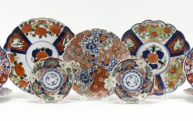 NINE ASSORTED JAPANESE IMARI DISHES A pair of 4.75" sauce dishes (one chipped), four 6.25" floriform dishes, a 7.5" dish in a pinwhe...