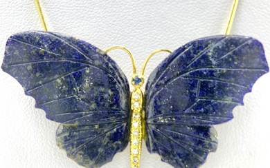 One-of-a-kind gold and gemstone butterfly pendant, made of carved lapis...