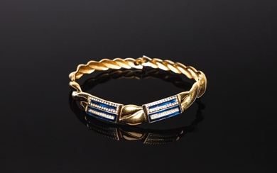 Pierre Cardin, Golden torque- style rigid necklace with rhinestones.