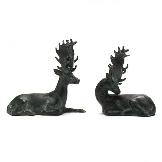 Pair of Cast Metal Recumbent Stag Candle Holders