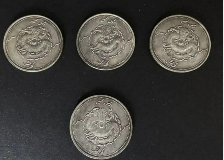 SET OF 4 CHINESE SILVER COINS