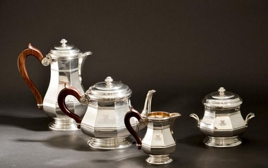 Plain silver tea and coffee set in the shape of...