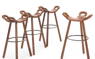 Set of four “Marbella” bar chairs with three legged frame and saddle shaped seat of patinated, solid beech. H. 74 cm.