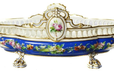 Sevres style blue urn form centerpiece with floral