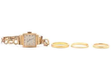 Three wedding rings, two 22 carat gold, one 18 carat gold.- Ramex gold wrist watch.