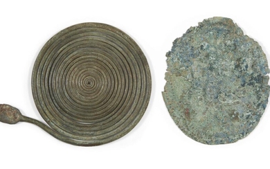 Two Italic bronze fibulae, circa 8th century B.C. , 10cm. diam. and 10.2cm. diam. (2) Provenance: Swiss private collection, Dr R. H. (1922-2007)