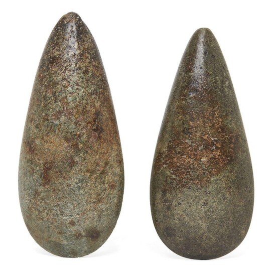 Two Neolithic polished stone axe heads, 15cm. and 13.2cm. long (2) Provenance: Private Collection Oliver Hoare (1945-2018)