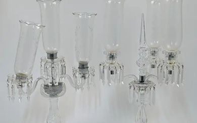 Two cut and moulded glass three-light candelabras with glass shades, 20th century,...