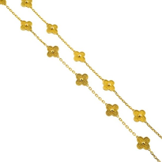 VAN CLEEF & ARPELS - an 18ct gold 'Alhambra' necklace.