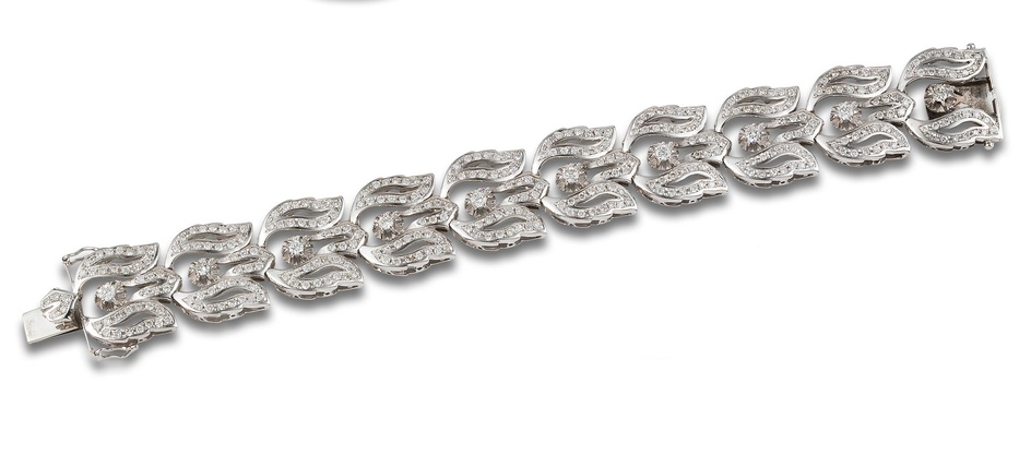 WIDE BRACELET IN WHITE GOLD AND DIAMONDS