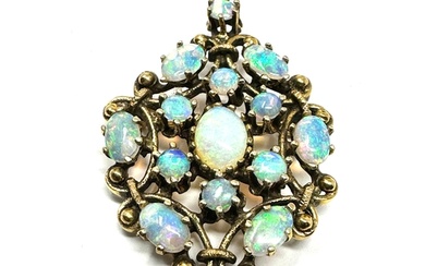 fine 14ct gold opal pendant /brooch measures approx 4cm by 2...