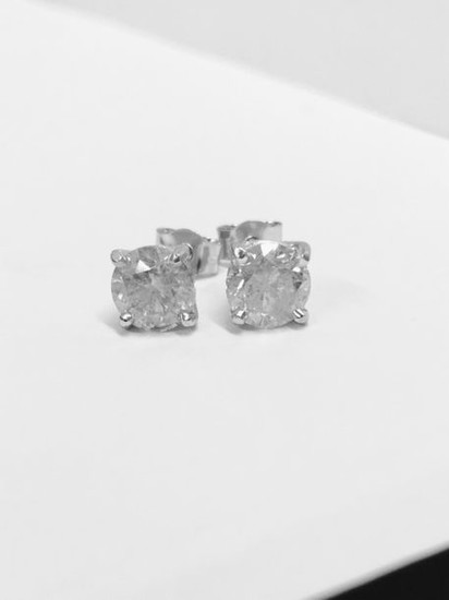2.00ct Diamond set solitaire style earrings. Each set...