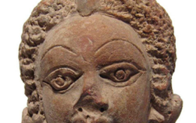 A beautifully detailed Indian terracotta head, Pawaya