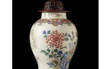 A porcelain vase, wood base and cover (defects and restorations) China, Qing dynasty, Yongzheng period (1723-1735), 18th century (h. 46...