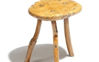 A 19th century primitive ash dairy stool, the burr…