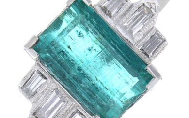 A Colombian emerald and diamond ring.