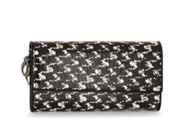 #DIOR A pocket hand wallet in white and black python...