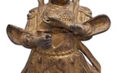 A GILT-BRONZE FIGURE OF A GUARDIAN KING, MING DYNASTY (1368-1644)