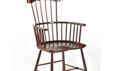 A mahogany ‘comb back’ Windsor armchair