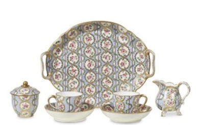 A Sèvres soft-paste porcelain hand-painted and parcel-gilt five-piece déjeuner...