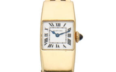 Cartier. A lady's early 18K gold manual wind rectangular bracelet watch