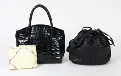 Italian handbag group, consisting of one Bottega Veneta intrecciato drawstring handbag, executed in black, together with...