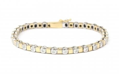 A 14 karat two tone gold diamond tennis bracelet. Of alternating white and yellow gold links set with twenty seven brilliant cut diamonds, ca. 0.80 ct. in total, ca. G-H, ca. VS. Gross weight: 18.7 g.