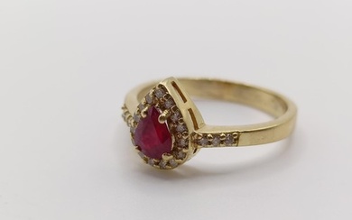 A 14ct gold, ruby and diamond ring, ring size O