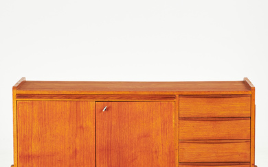 A 1950s/60s SIDEBOARD, teak veneer, drawers and cabinets with shelves on the back, pull-out desk.