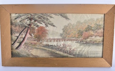 A 19TH CENTURY JAPANESE MEIJI PERIOD EMBROIDERED SILK PANEL depicting a river landscape. 42 cm x 24